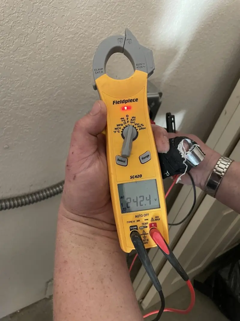 Voltage testing with clamp meter during Generator Installation in South Toms River